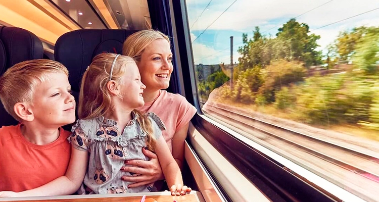 Children enjoying a fun and exciting train ride, filled with smiles and adventure 